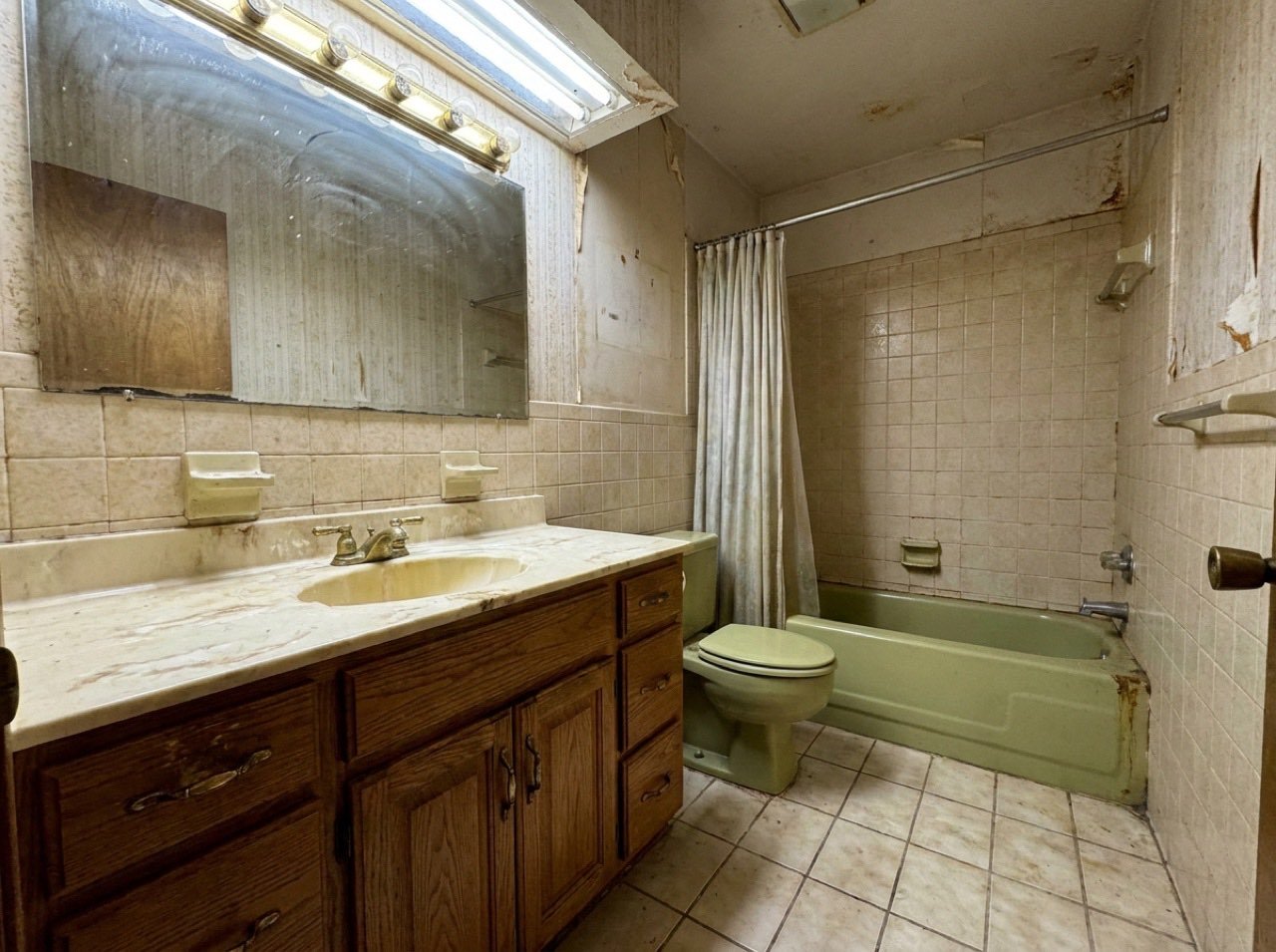Dated bathroom before view